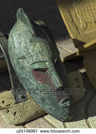 Stock Photo - Close-up of an antique mask, Tamzawrout, Morocco. Fotosearch