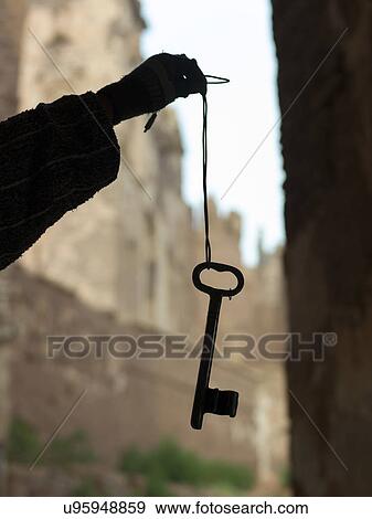 Stock Photo - Close-up of person's hand holding key at Telouet Kasbah, Ouarzazate, Morocco. Fotosearch