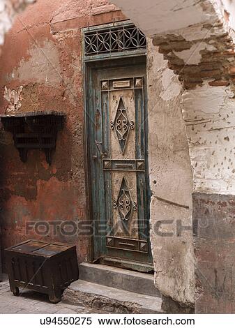 Stock Photography - Closed door of an old house, Marrakesh, Morocco. Fotosearch