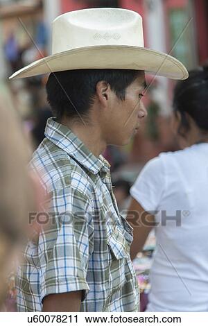 Stock Image - Closeup of a man wearing hat on a street, Copan, Copan Ruinas, Honduras. Fotosearch