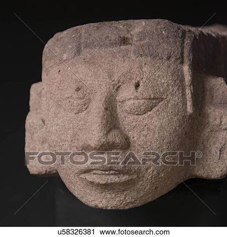 Stock Image - Closeup of a Mayan clay statue in Mayan Sculpture Museum, Copan, Copan Ruinas, Copan Department, Honduras. Fotosearch