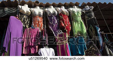 Stock Image - Clothing shop display in Medina, Marrakesh, Morocco. Fotosearch