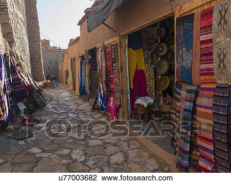 Stock Image - Clothing store display on street, Ait Benhaddou, Ouarzazate, Morocco. Fotosearch