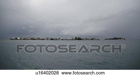 Clouds over the sea, Cayman Cay, Utila Island, Bay Islands, Honduras View Large Photo Image Stock Photo - Clouds over the sea, Cayman Cay, Utila Island, Bay Islands, Honduras. Fotosearch
