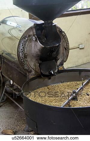 Stock Image - Coffee roasting machine, Finca Santa Isabel, Copan Ruinas, Honduras. Fotosearch