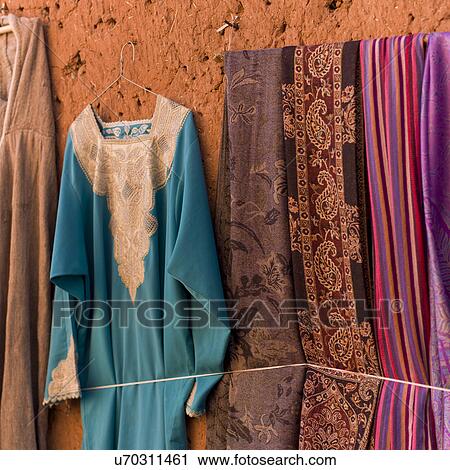 Colorful clothes for sale, Ouarzazate, Morocco View Large Photo Image Stock Image - Colorful clothes for sale, Ouarzazate, Morocco. Fotosearch