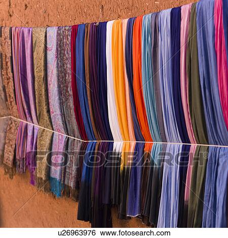 Colorful clothes for sale, Ouarzazate, Morocco View Large Photo Image Stock Photograph - Colorful clothes for sale, Ouarzazate, Morocco. Fotosearch