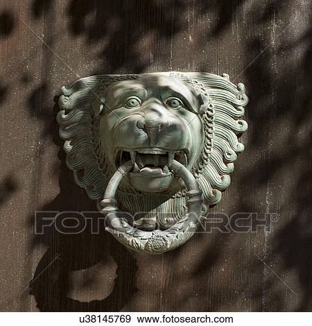 Stock Photo - Detail of a door knocker at Kasbah Tamadot, Asni, Morocco. Fotosearch