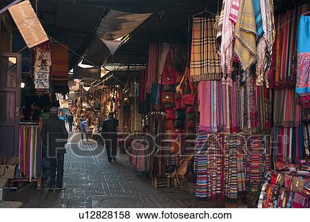 Display of cloths on street market, Marrakesh, Morocco View Large Photo Image Stock Photo - Display of cloths on street market, Marrakesh, Morocco. Fotosearch