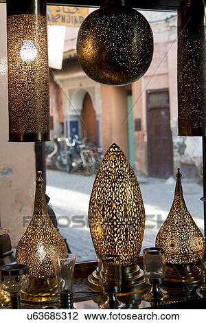 Stock Image - Display of lanterns for sale at shop, Medina, Marrakesh, Morocco. Fotosearch