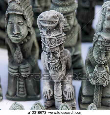 Display of sculptures for sale on market stall, Barrio El Centro, Copan, Copan Ruinas, Honduras View Large Photo Image Stock Image - Display of sculptures for sale on market stall, Barrio El Centro, Copan, Copan Ruinas, Honduras. Fotosearch
