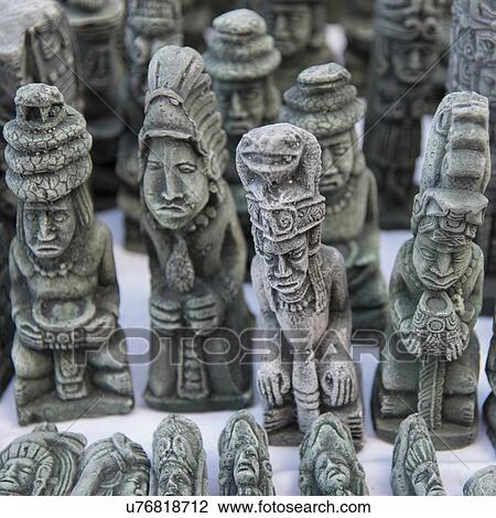 Display of sculptures for sale on market stall, Barrio El Centro, Copan, Copan Ruinas, Honduras View Large Photo Image Stock Image - Display of sculptures for sale on market stall, Barrio El Centro, Copan, Copan Ruinas, Honduras. Fotosearch
