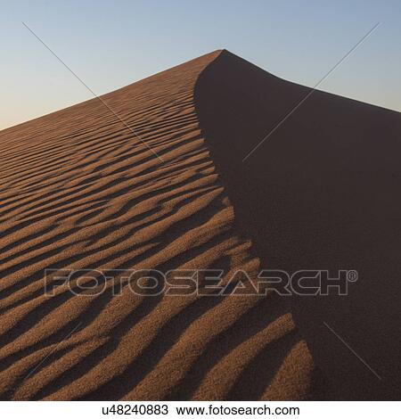 Stock Image - Erg Chegaga Dunes in Sahara Desert, Souss-Massa-Draa, Morocco. Fotosearch