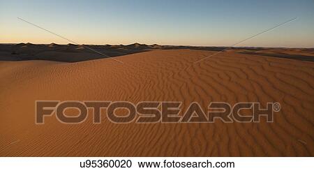 Stock Image - Erg Chegaga Dunes in Sahara Desert, Morocco. Fotosearch