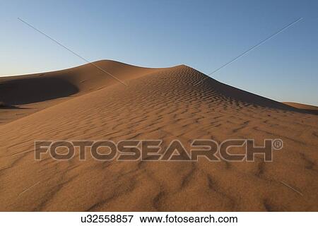 Stock Photo - Erg Chegaga Dunes in Sahara Desert, Souss-Massa-Draa, Morocco. Fotosearch