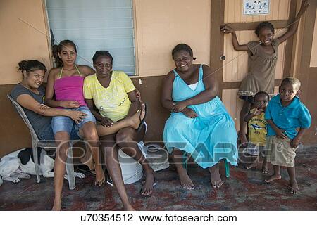 Family at their home, Cayman Cay, Utila Island, Bay Islands, Honduras View Large Photo Image Stock Image - Family at their home, Cayman Cay, Utila Island, Bay Islands, Honduras. Fotosearch