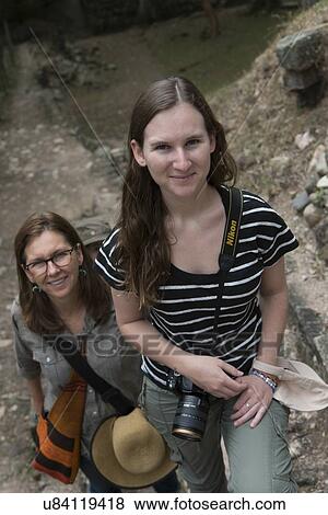 Female tourists at an archaeological site, Copan, Copan Ruinas, Honduras View Large Photo Image Stock Photo - Female tourists at an archaeological site, Copan, Copan Ruinas, Honduras. Fotosearch
