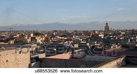 Stock Photograph - High angle view of a city, Marrakesh, Morocco. Fotosearch