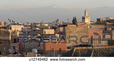 Stock Image - High angle view of buildings in a city, Medina, Marrakesh, Morocco. Fotosearch