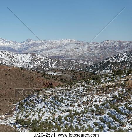 High angle view of snowy valley in winter, Tizi n'Tichka, Atlas Mountains, Morocco View Large Photo Image Stock Image - High angle view of snowy valley in winter, Tizi n'Tichka, Atlas Mountains, Morocco. Fotosearch