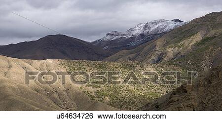 Stock Photograph - High angle view of valley with mountain pass, Tizi n'Tichka, Atlas Mountains, Morocco. Fotosearch