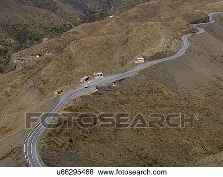 High angle view of winding road on mountain pass, Tizi n'Tichka, Atlas Mountains, Morocco View Large Photo Image Stock Photo - High angle view of winding road on mountain pass, Tizi n'Tichka, Atlas Mountains, Morocco. Fotosearch