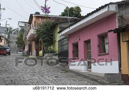 Houses along the street, Barrio El Centro, Copan, Copan Ruinas, Honduras View Large Photo Image Stock Image - Houses along the street, Barrio El Centro, Copan, Copan Ruinas, Honduras. Fotosearch