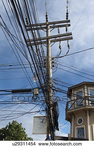 Low angle view of power cables, Utila Island, Bay Islands, Honduras View Large Photo Image Picture - Low angle view of power cables, Utila Island, Bay Islands, Honduras. Fotosearch