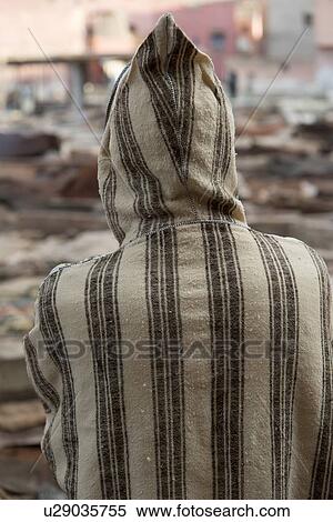 Man standing at tannery in medina of Marrakesh, Morocco View Large Photo Image Stock Photography - Man standing at tannery in medina of Marrakesh, Morocco. Fotosearch
