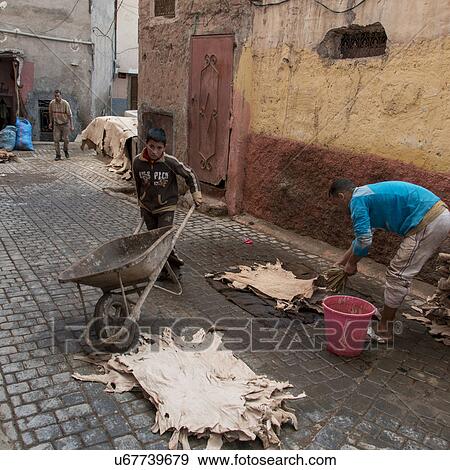 Man washing leathers and hides in tanneries, Marrakesh, Morocco View Large Photo Image Stock Photo - Man washing leathers and hides in tanneries, Marrakesh, Morocco. Fotosearch