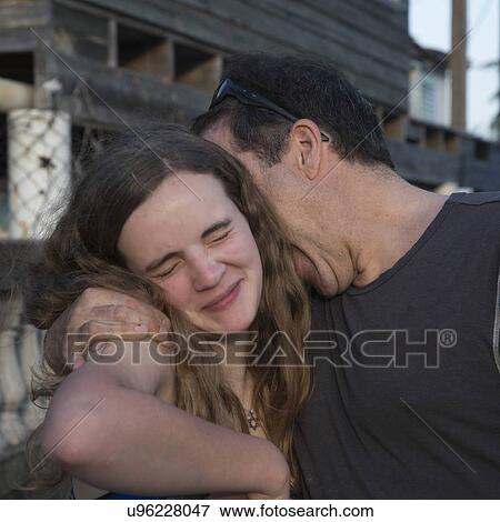 Man with his daughter, Cayman Cay, Utila Island, Bay Islands, Honduras View Large Photo Image Stock Photo - Man with his daughter, Cayman Cay, Utila Island, Bay Islands, Honduras. Fotosearch