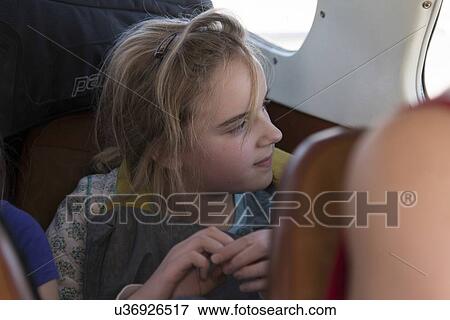 Passengers traveling in a seaplane, Bay Islands, Honduras View Large Photo Image Stock Photo - Passengers traveling in a seaplane, Bay Islands, Honduras. Fotosearch