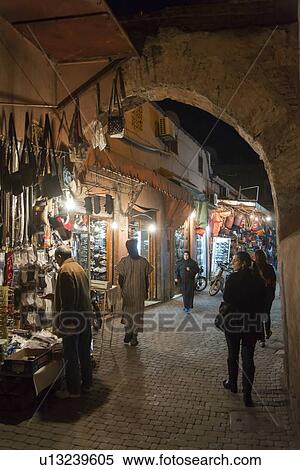 Stock Photography - People at a market, Arset Moulay Moussa, Djemma El Fna, Marrakesh, Morocco. Fotosearch