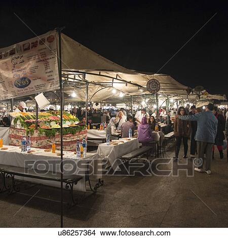 People at food stalls, Djemma El Fna, Marrakesh, Morocco View Large Photo Image Picture - People at food stalls, Djemma El Fna, Marrakesh, Morocco. Fotosearch