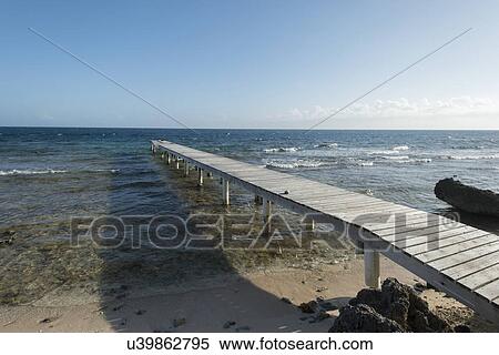 Pier on the beach, Utila, Bay Islands, Honduras View Large Photo Image Stock Photography - Pier on the beach, Utila, Bay Islands, Honduras. Fotosearch