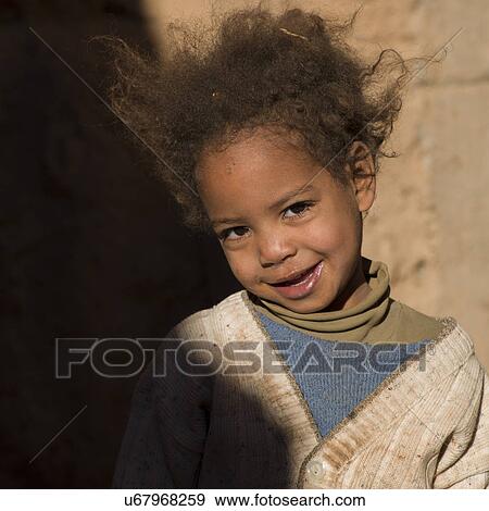 Portrait of a boy smiling, Kasbah Azul, Agdz, Morocco View Large Photo Image Stock Photo - Portrait of a boy smiling, Kasbah Azul, Agdz, Morocco. Fotosearch