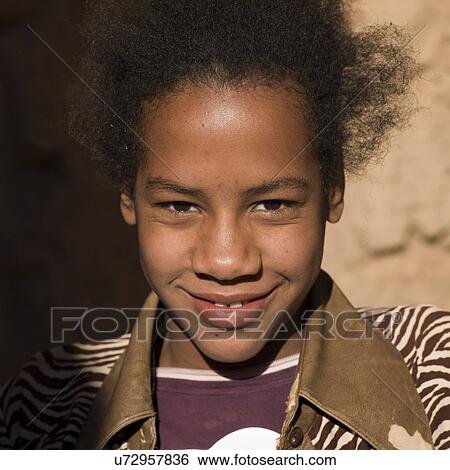 Portrait of a boy smiling, Kasbah Azul, Agdz, Morocco View Large Photo Image Stock Photograph - Portrait of a boy smiling, Kasbah Azul, Agdz, Morocco. Fotosearch