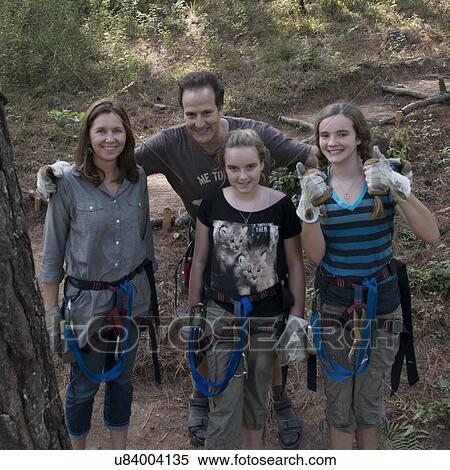 Portrait of a couple standing with their children, Copan, Copan Ruinas, Copan Department, Honduras View Large Photo Image Stock Photography - Portrait of a couple standing with their children, Copan, Copan Ruinas, Copan Department, Honduras. Fotosearch