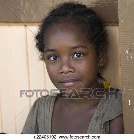 Stock Image - Portrait of a girl, Cayman Cay, Utila Island, Bay Islands, Honduras. Fotosearch