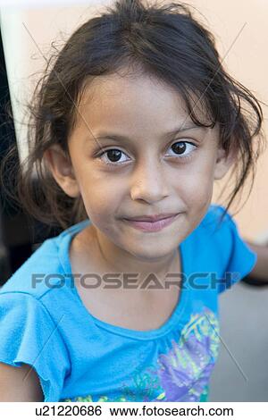 Stock Photograph - Portrait of a girl, Utila, Bay Islands, Honduras. Fotosearch