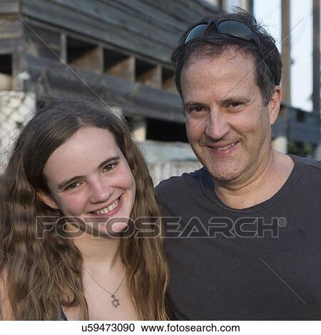 Portrait of a man and his daughter smiling, Cayman Cay, Utila Island, Bay Islands, Honduras View Large Photo Image Stock Image - Portrait of a man and his daughter smiling, Cayman Cay, Utila Island, Bay Islands, Honduras. Fotosearch