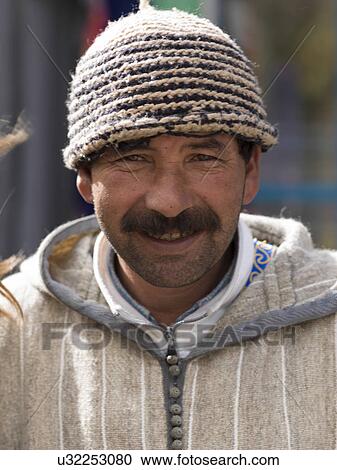 Stock Image - Portrait of a man smiling, Morocco. Fotosearch