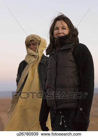 Portrait of a woman in Sahara Desert, Morocco View Large Photo Image Stock Photo - Portrait of a woman in Sahara Desert, Morocco. Fotosearch