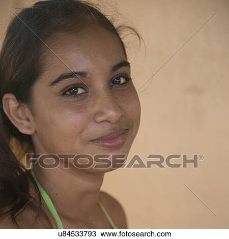 Portrait of a woman smiling, Cayman Cay, Utila Island, Bay Islands, Honduras View Large Photo Image Stock Image - Portrait of a woman smiling, Cayman Cay, Utila Island, Bay Islands, Honduras. Fotosearch