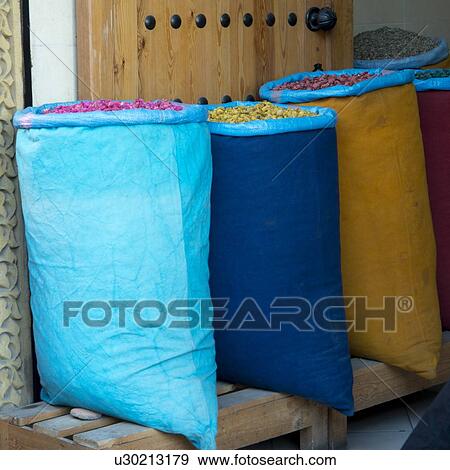 Sacks of food for sale at market stall, Medina, Marrakesh, Morocco View Large Photo Image Stock Photo - Sacks of food for sale at market stall, Medina, Marrakesh, Morocco. Fotosearch