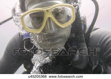 Stock Photo - Scuba diver underwater, Utila, Bay Islands, Honduras. Fotosearch