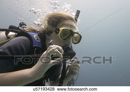 Stock Photo - Scuba diver underwater, Utila, Bay Islands, Honduras. Fotosearch