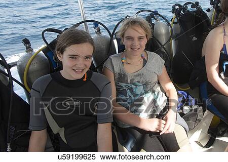 Scuba divers on tourboat, Utila, Bay Islands, Honduras View Large Photo Image Stock Photography - Scuba divers on tourboat, Utila, Bay Islands, Honduras. Fotosearch