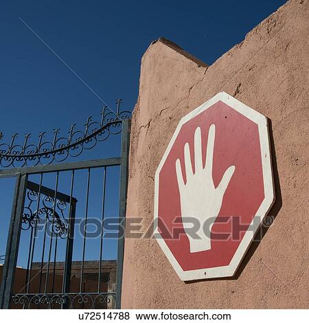 Stock Photo - Sign on gate of Atlas Corporation Studios, Ouarzazate, Morocco. Fotosearch