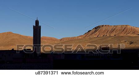 Stock Image - Silhouette of a tower in village, Ouarzazate, Morocco. Fotosearch